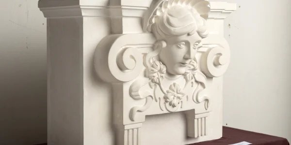 Országos Idegennyelvű Könyvtár klasszicista pilaszterfőjének másolata